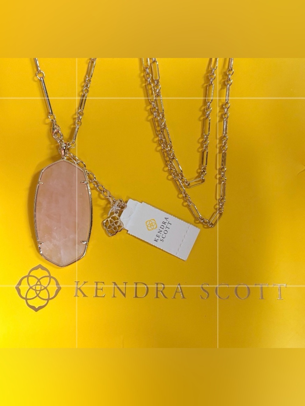 Kendra Scott Gold Necklace with Light Pink Stone Pendant